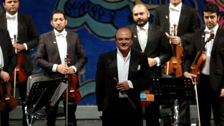 The second violinist in the concert of the Iranian Chamber Orchestra Contucdet by Manouchehr Sahbaie