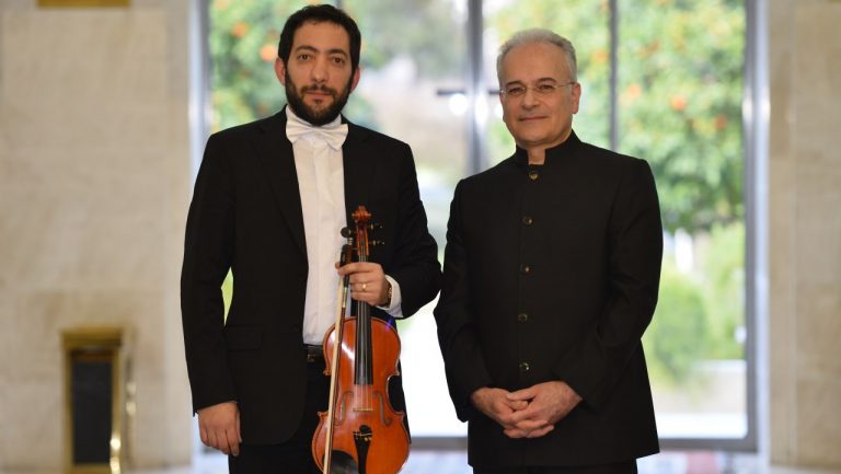 The second violinist in the Arco orchestra Concert Contucted by Ebrahim Lotfi in the concert of Shiraz city