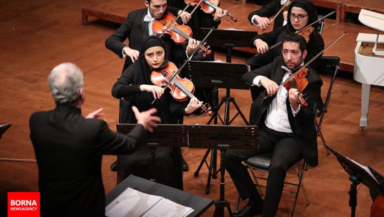 The second violinist in the Arco Orchestra Concert Contucted by Ebrahim Lotfi