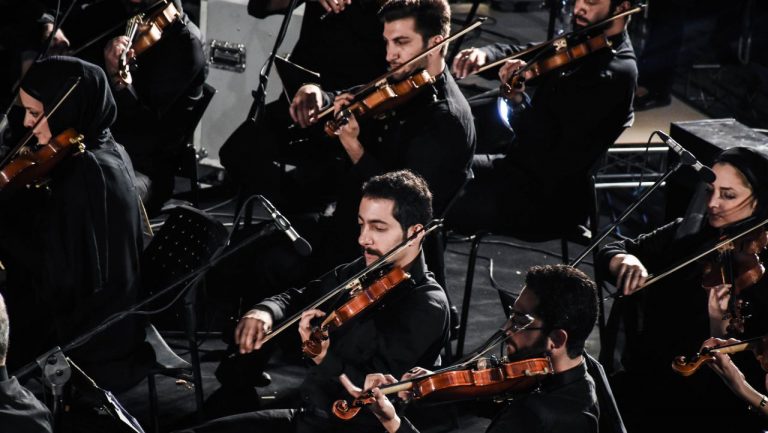The second violinist in the concert of Javadaneha Orchestra Conducted by Majid Entezami
