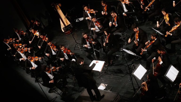 The second violinist in the concert of Iran and Austria Orchestra Contucted by Maziar Younesi